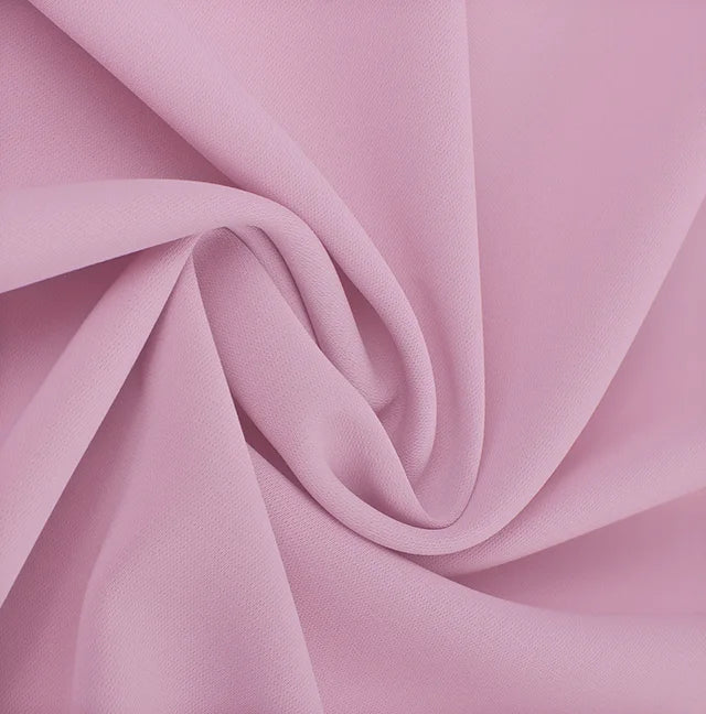 Marcelina | Elegante tweedelige set met pailletten en kleurrijk blokpatroon