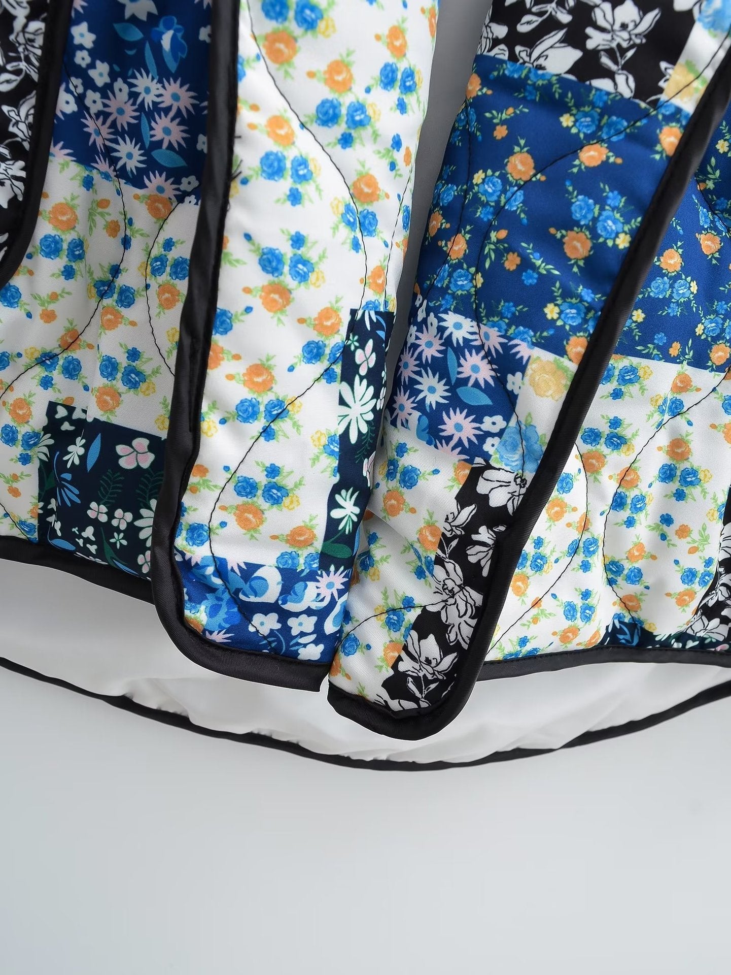 Oranji ® | Revvy | Jas met bloemenpatchworkprint