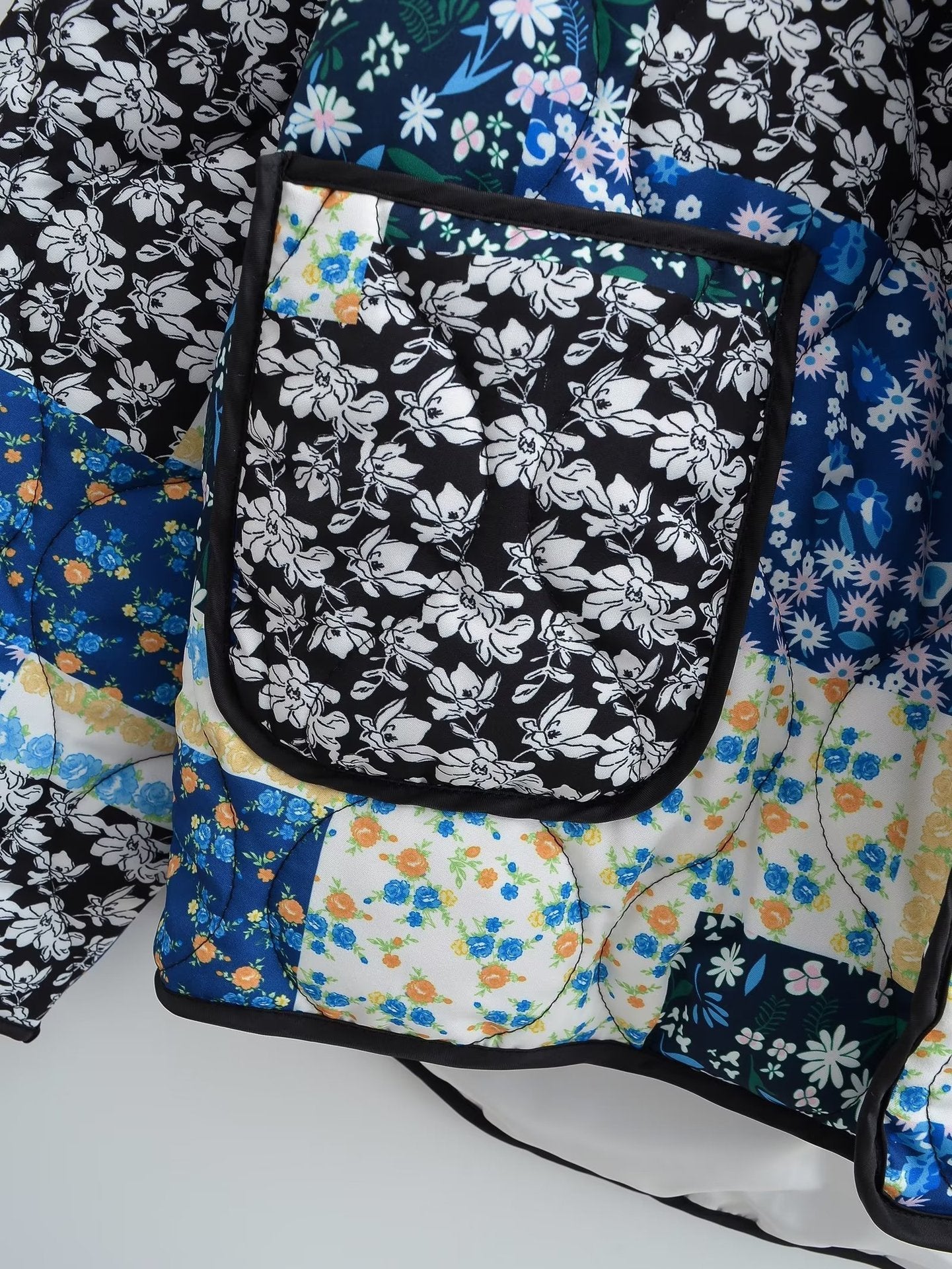 Oranji ® | Revvy | Jas met bloemenpatchworkprint