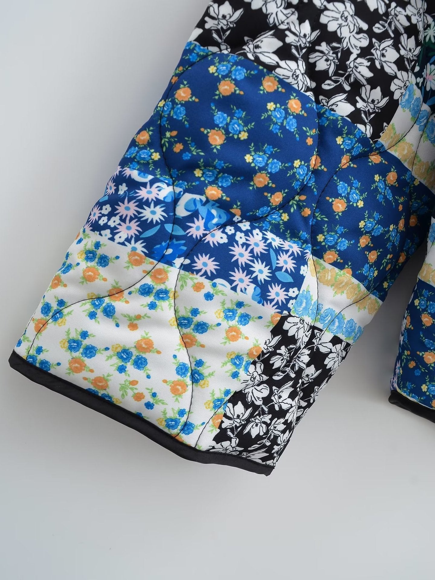 Oranji ® | Revvy | Jas met bloemenpatchworkprint