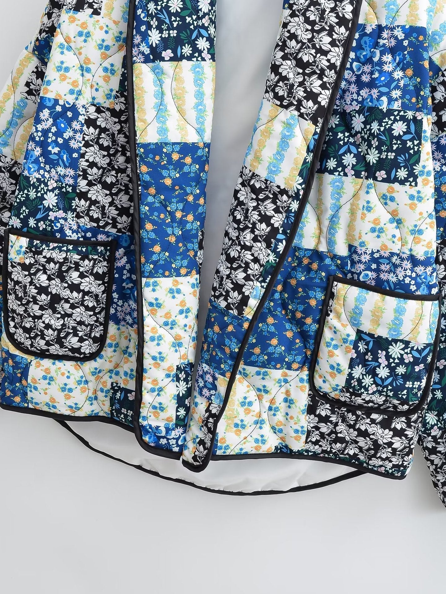 Oranji ® | Revvy | Jas met bloemenpatchworkprint