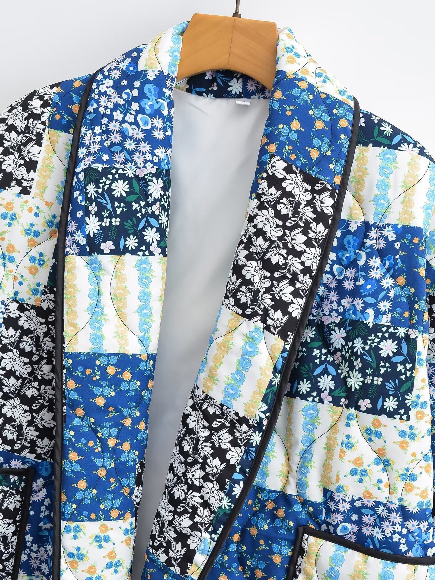 Oranji ® | Revvy | Jas met bloemenpatchworkprint
