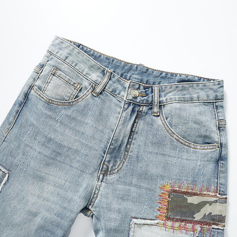 Heren jeans met borduursel en patchwork 86112741Y