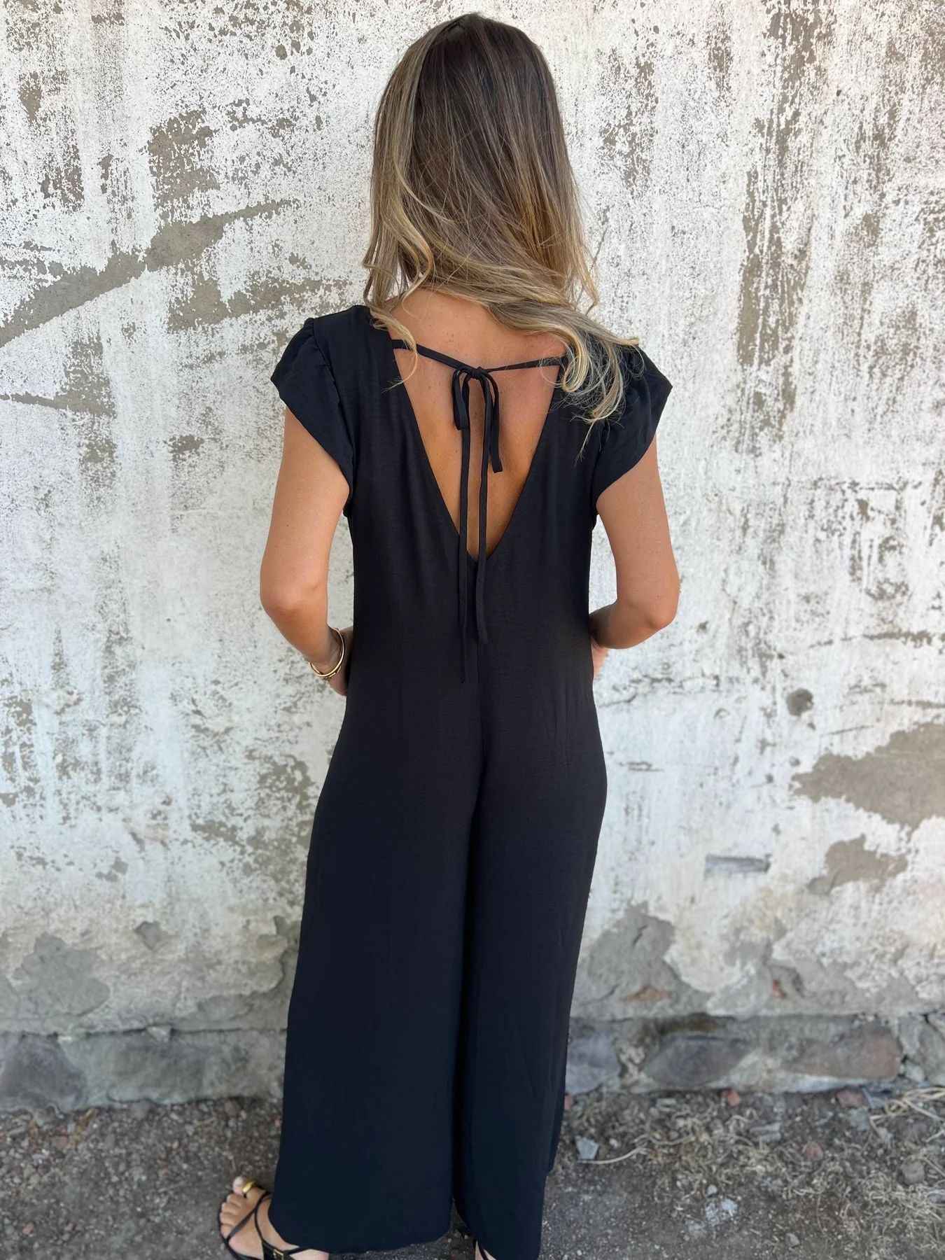 Karolina – Jumpsuit met Dekolleté en Panterprint
