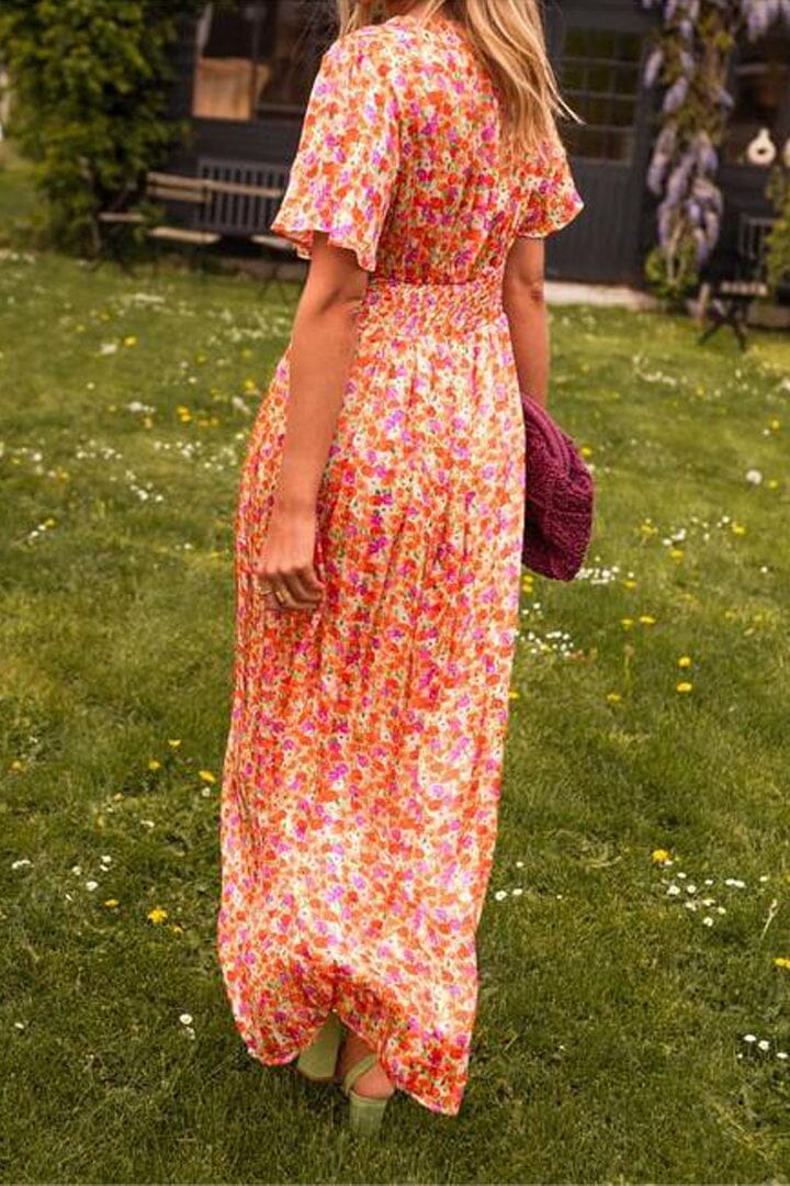Oranji ® |   Elegante Maxi-jurk met V-hals